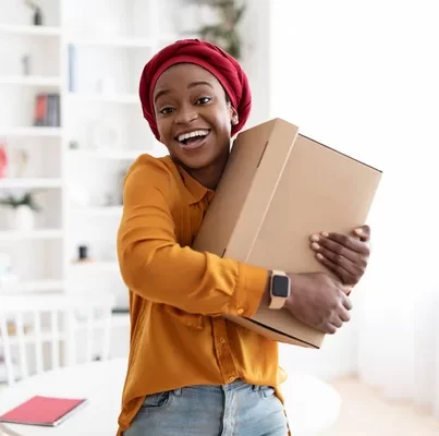 Excited Young Black American Woman Receiving Parcel from Chennai